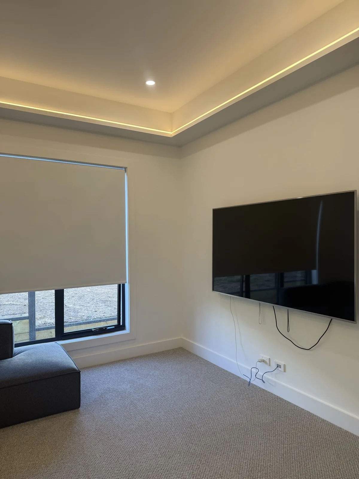 Freshly painted living room with LED ceiling recess and clean white walls